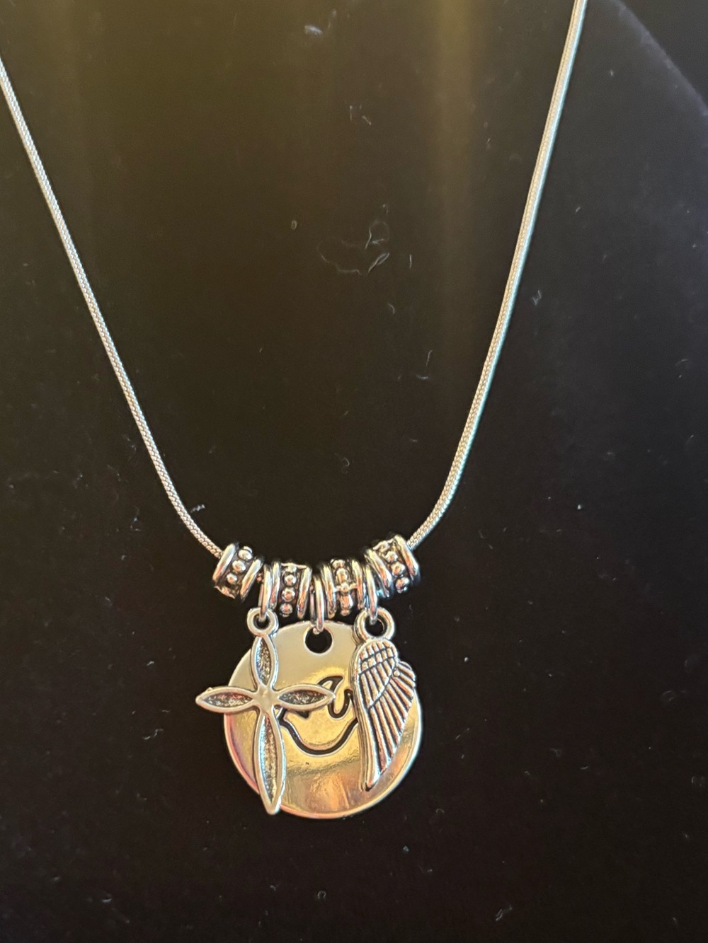 Silver round Charm Necklace with Star & Wing Pendant